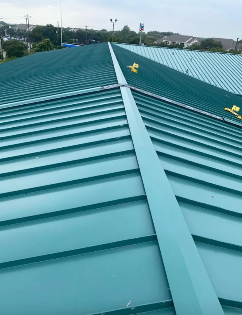 Green commercial metal roof ridge and valley for Metal Roof Repair in Silver Springs